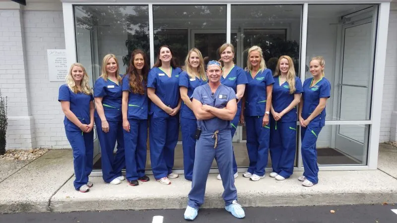 photo of the staff and the doctor