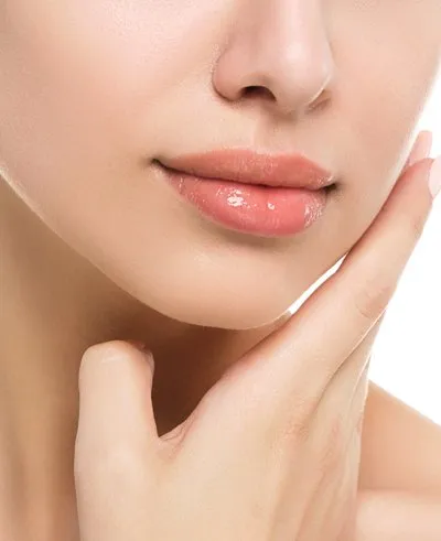 woman touching her face